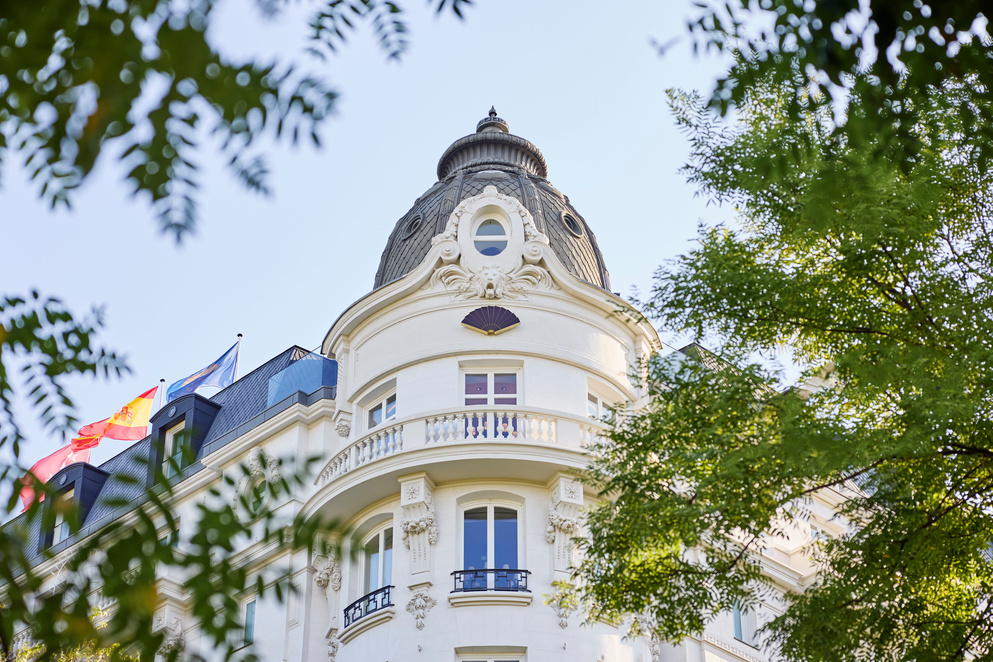 Mandarin Oriental Ritz Madrid beneath green trees