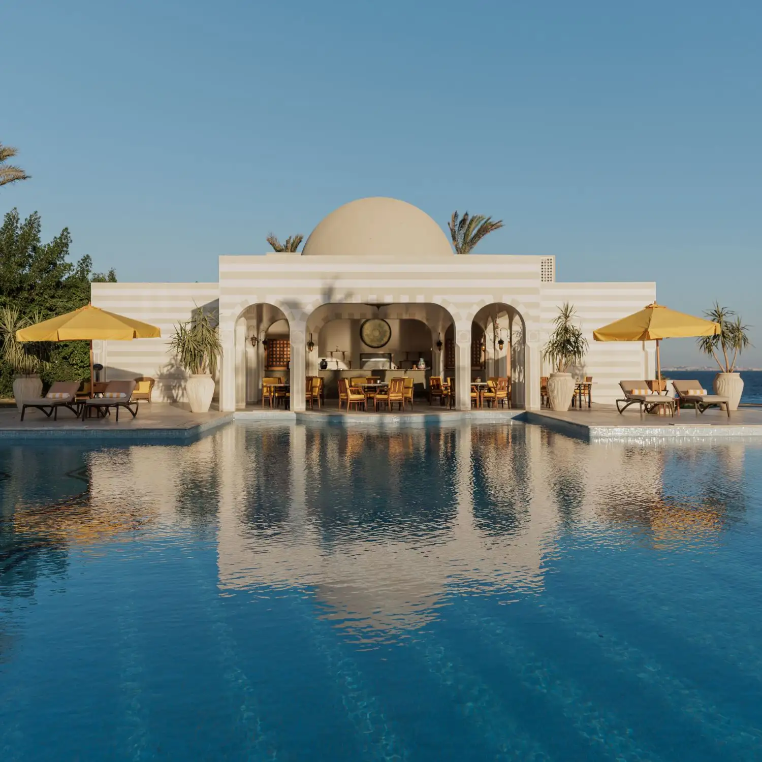 The pool and pergola at The Oberoi Beach Resort, Sahl Hasheesh